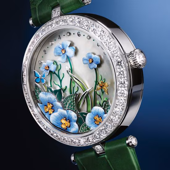 Poetic Complications Collection, Lady Avel Brise d’Été watch, rhodium-plated 18K white gold, 18K yellow gold, 18K rose gold, diamonds, tsavorites garnets, spessartites garnets, white mother-of-pearl, enamel, miniature painting, self-winding mechanical movement with flower-breezing and butterfly wandering module, 12-hour time display. Éloi & Avel.